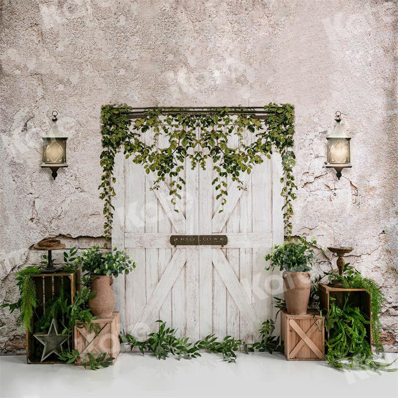 Kate写真撮影のための白い納屋のドアの背景緑の植物
