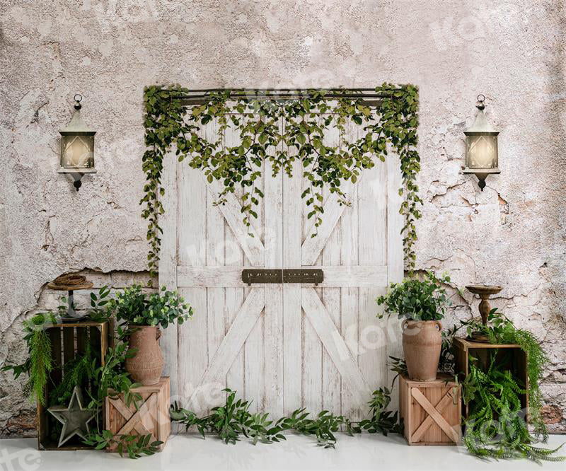 Kate写真撮影のための白い納屋のドアの背景緑の植物
