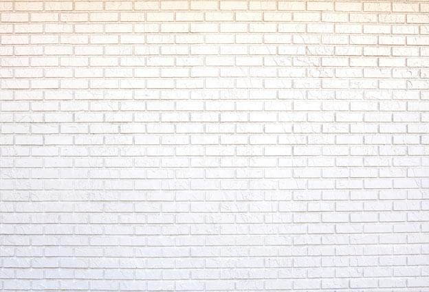 写真のためのkateつの白いレンガの古いレトロな壁の背景
