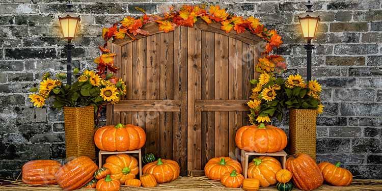 kate秋のカボチャの背景レンガの納屋のドア